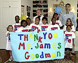 YMCA kids thank Jim Goodmon.