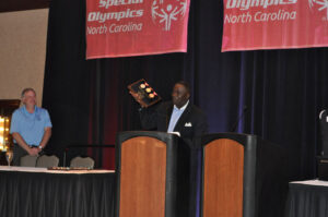 WRAL-TV's Ken Smith receives the Special Olympics NC President's Award at a ceremony on Saturday, July 18, 2015, for his commitment to the organization.