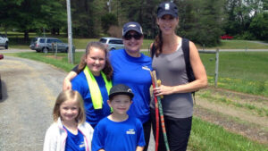 WRAL-TV's Lynda Loveland (right) poses with a young man named Heath and his family at the inaugural Trailblaze Challenge for Make-A-Wish at Pilot Mountain.  She says he is why she took part iChallenge: "He's had a heart transplant and is an amazing kid. Wishes mean everything to these children and their families."